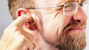 how to clear a clogged ear